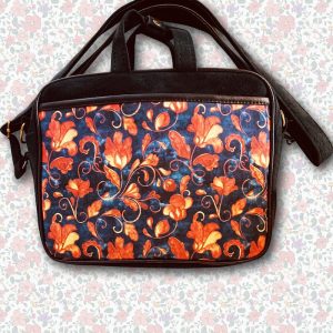 A tablet bag featuring autumn-inspired colors and patterns, perfect for adding a touch of seasonal charm to your ensemble.