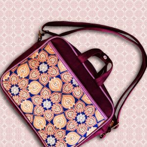 A tablet bag featuring a vibrant flourish pattern, designed to add a pop of color to your tech accessories.